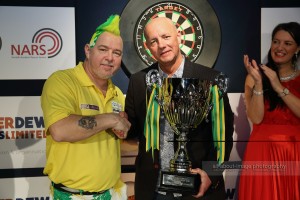 Lord Russell Baker Presenting The Norwich Match Play Darts Championship Trophy to Peter Wright 02-04-2016