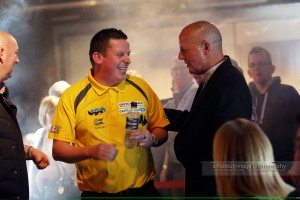 Lord Russell Baker and Dave 'Chizzy' Chisnall Share A Smile at The Norwich Match Play Darts Championships 02-04-2016